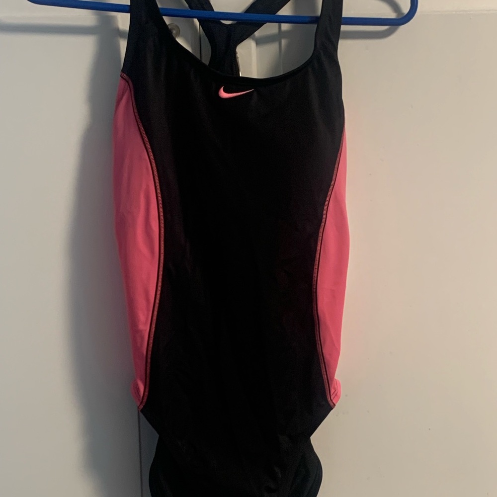 Ladies Nike, one piece racer back swimsuit, size medium new